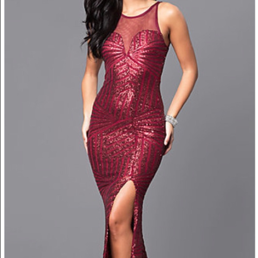 Long red formal dress with show stopping split